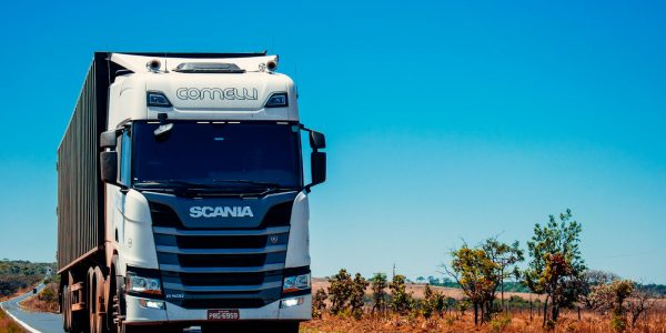 Photo by Gabriel Santos white truck on road during daytime